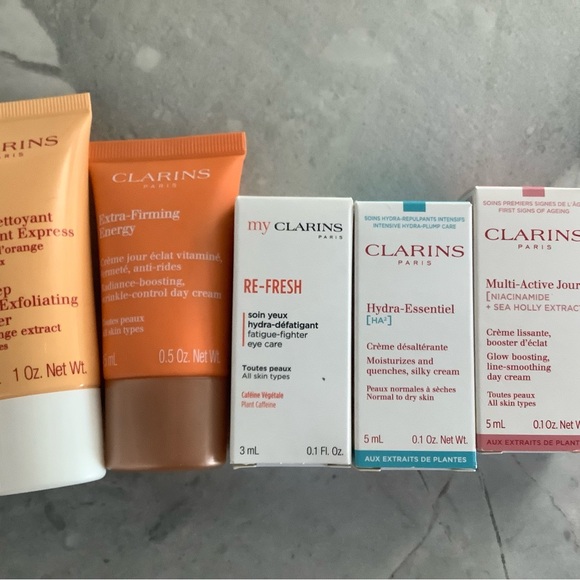 🆕Clarins Skincare Collection with Lime Green Pouch - Picture 2 of 5